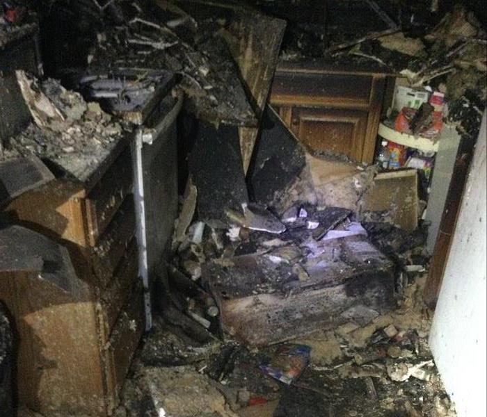 A kitchen destroyed after a fire