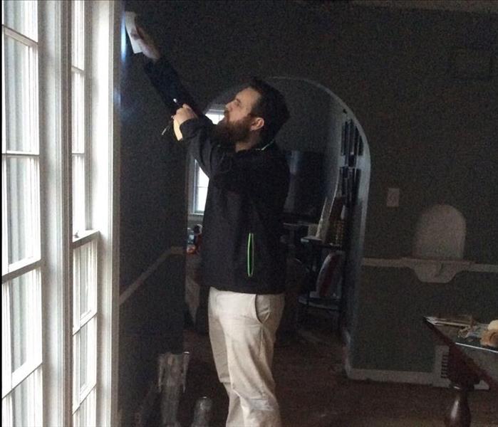 A SERVPRO inspector performing a soot inspection